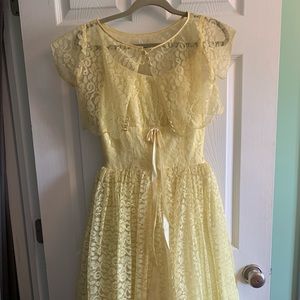 Vintage yellow 1950s prom dress